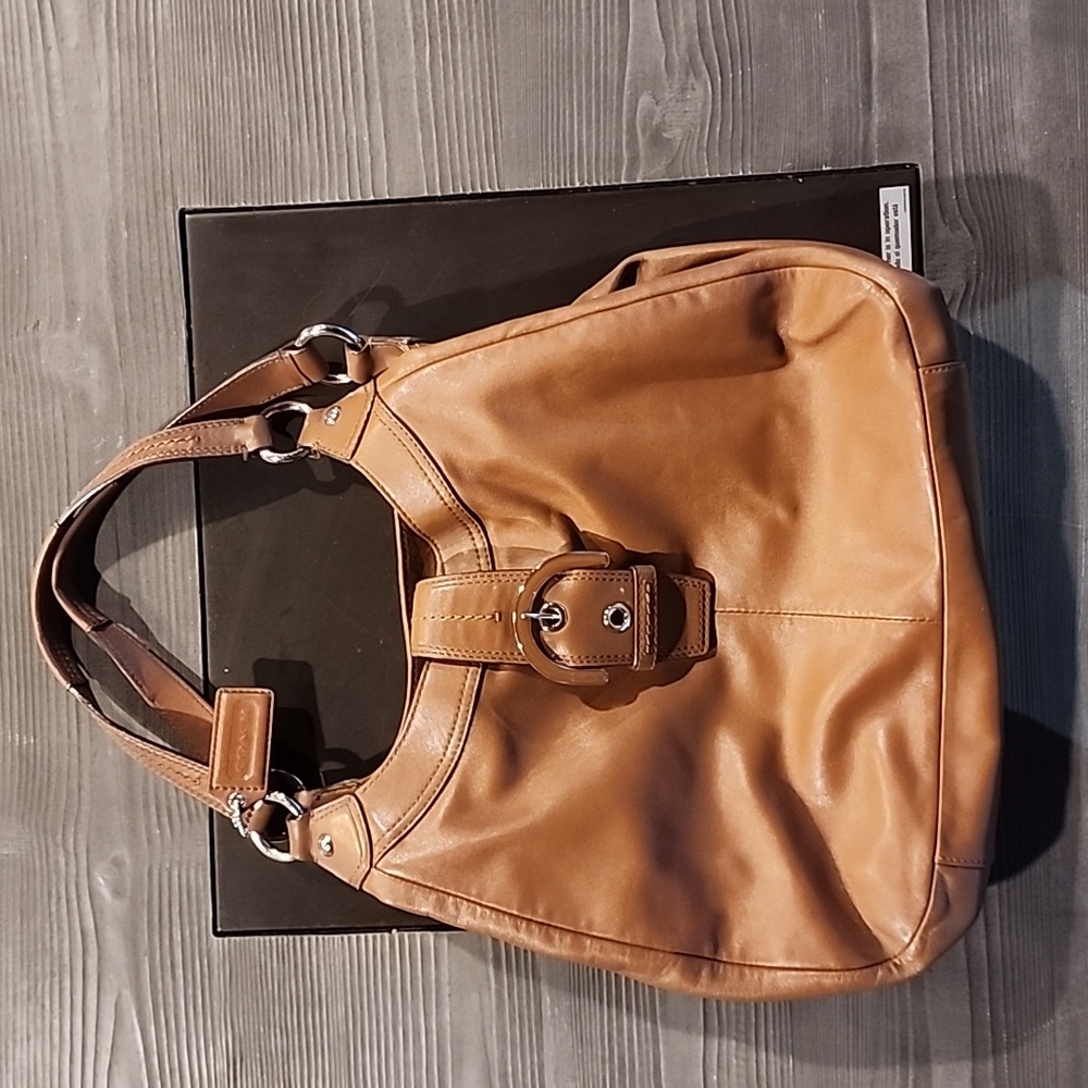 Coach Soho Hobo satchel leather bag.Soft leather,dark tan/camel color.